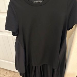 Beautiful black top with a train on the back.